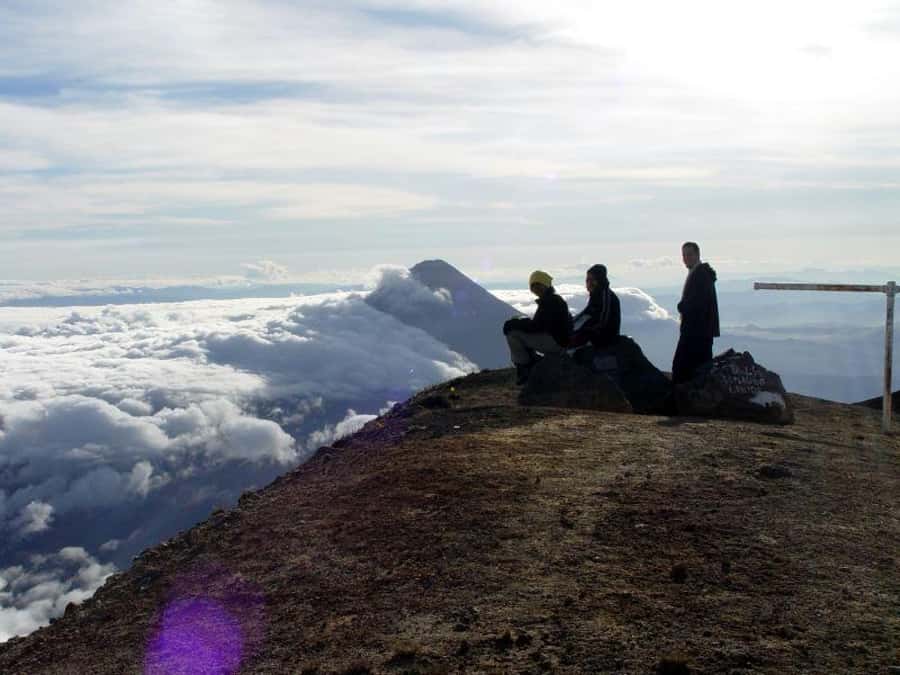 1 Day Acatenango Volcano Hike from Antigua - The summit: cold rock, wide views, and Fuego