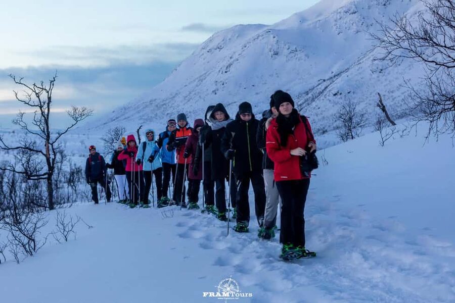 Arctic hike on Kvaløya Island with drinks and snacks - Snowshoes, poles, and the first steps