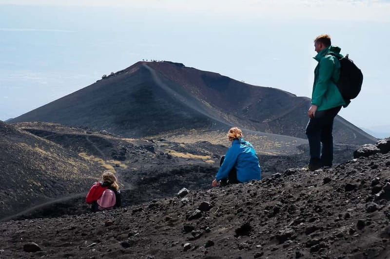Catania: Mount Etna Adventurous Hiking Tour with Equipment - From Piazza Stesicoro to the slopes of Etna