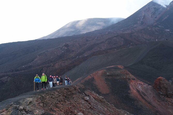 Etna excursion 3000 meters with 4x4 cable car and Trekking - The descent is loose, steep, and dusty