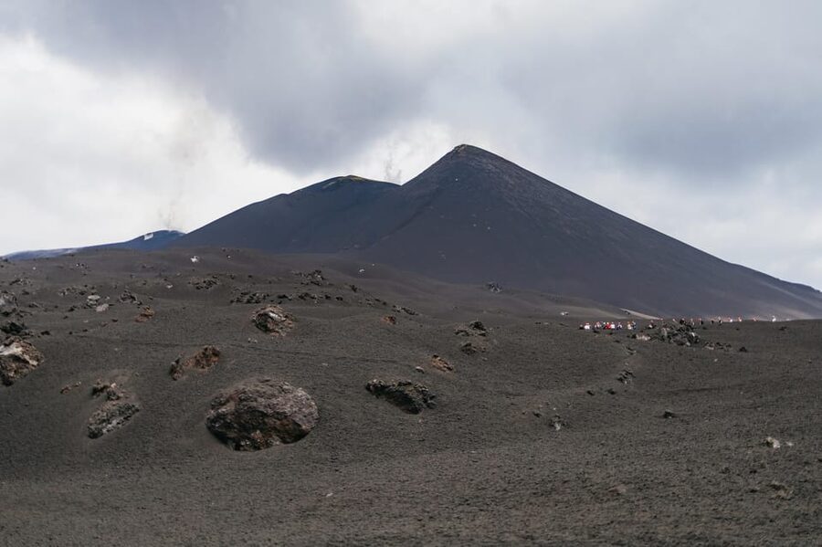 Etna: summit craters trekking with volcano guide 3350mt - The first uphill walk across volcanic sand and lava