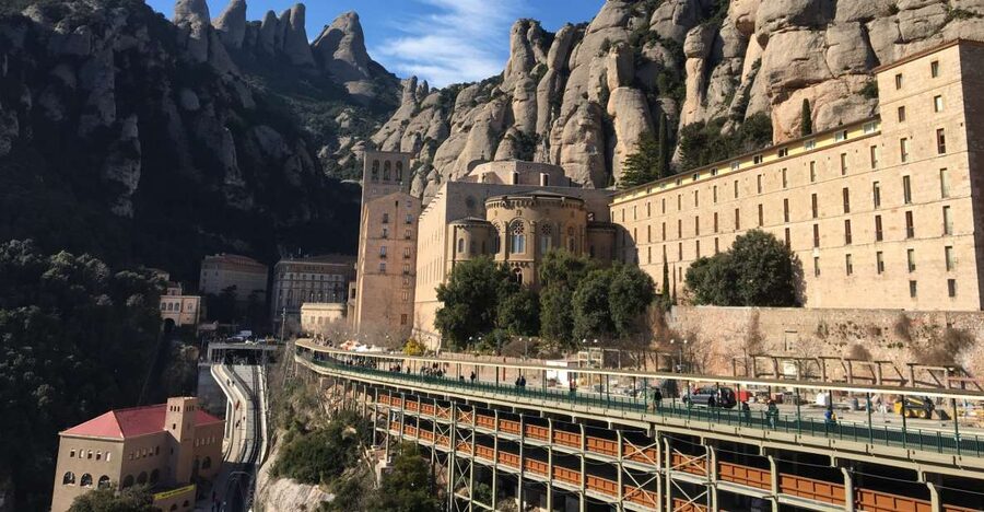 From Barcelona: Montserrat Monastery & Scenic Mountain Hike - The Benedictine monastery and the Black Madonna