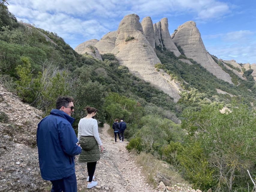 From Barcelona: Montserrat Monastery & Scenic Mountain Hike - Free time, local food, and the short final stop