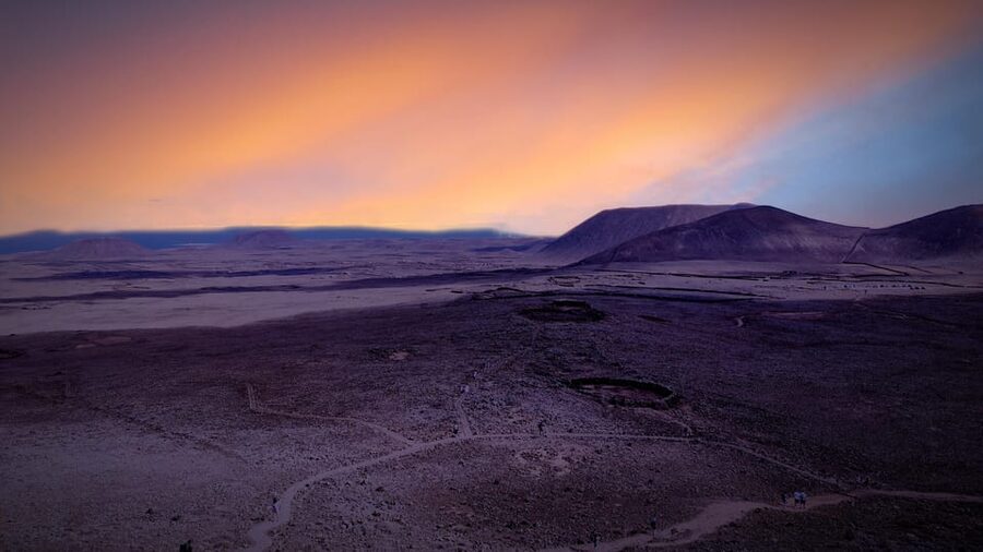 From Fuerteventura: Sunset Hike at Volcano with Scenic Views - What the guides add to the volcanic setting