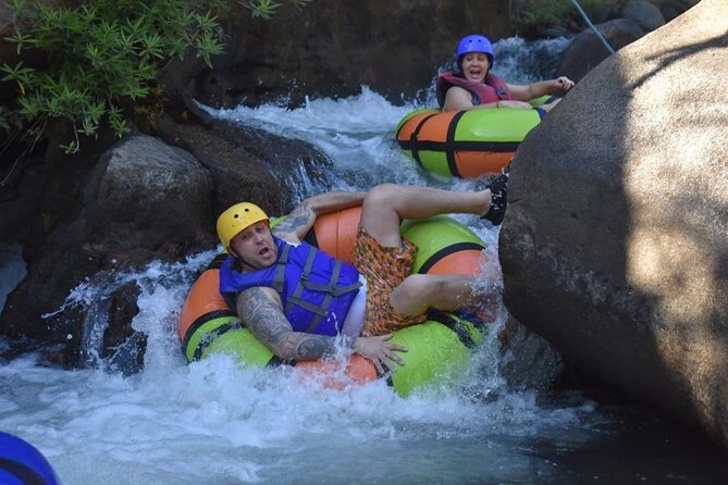 La Leona Waterfall Hike and River Tubing - A waterfall reached by water, rope, and rock