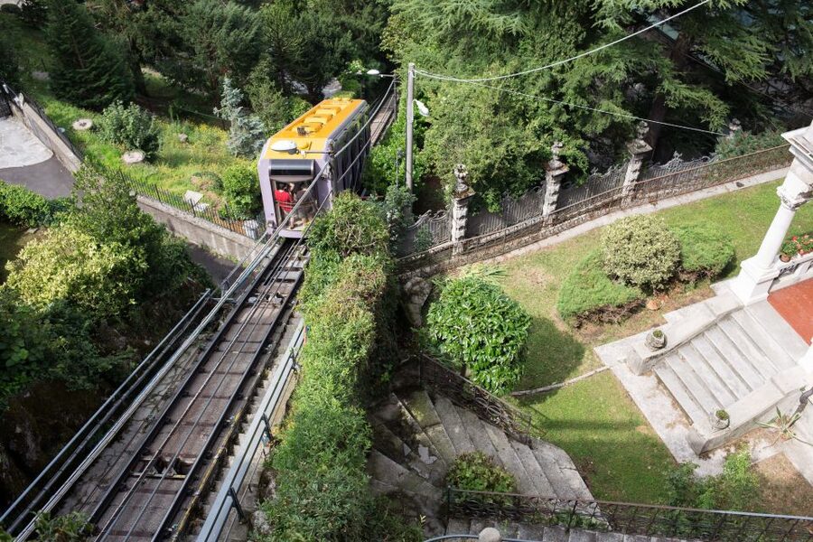 Lake Como: Easy Mountain Trek with Funicular & Boat Ride - Monte Piatto and the church of Santa Elisabetta