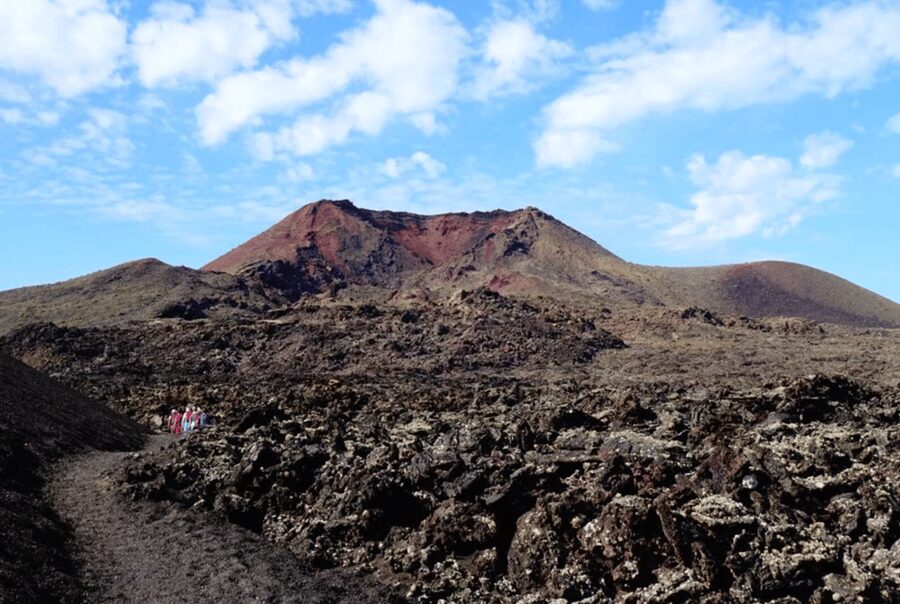 Lanzarote: Hike Across Timanfaya's Volcanic Landscapes - Walking Into Timanfaya’s Black Lava Fields