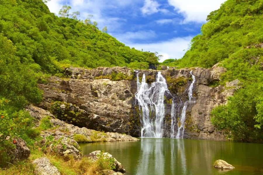 Mauritius: 7 Waterfalls Hike with Lunch and Hotel Transfers - Starting at Henrietta, where the forest replaces the beach