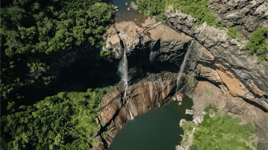 Mauritius: Tamarind Falls Highlights 3-Hour Hiking Trip - Walking from sugarcane fields into the canyon