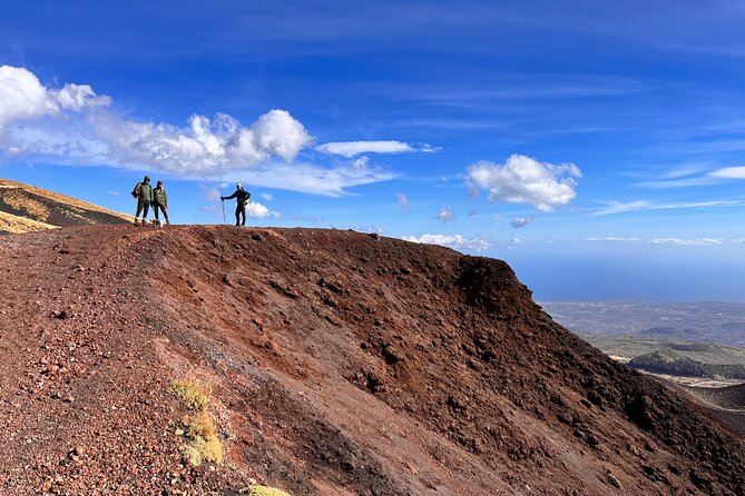 Mount Etna Adventurous Hiking Tour with Equipment - Craters, smoke, and views toward the Ionian Sea
