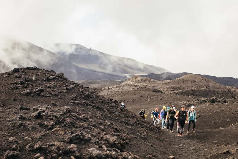 Mount Etna: Guided Trek 3,000 Meters to the Summit - Hiking across ash, rock, and lava flows