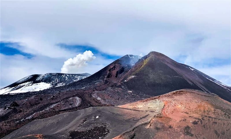 Mount Etna: Trek to 3000m with cable car and 4x4 - Down through black sand to the Bove Valley