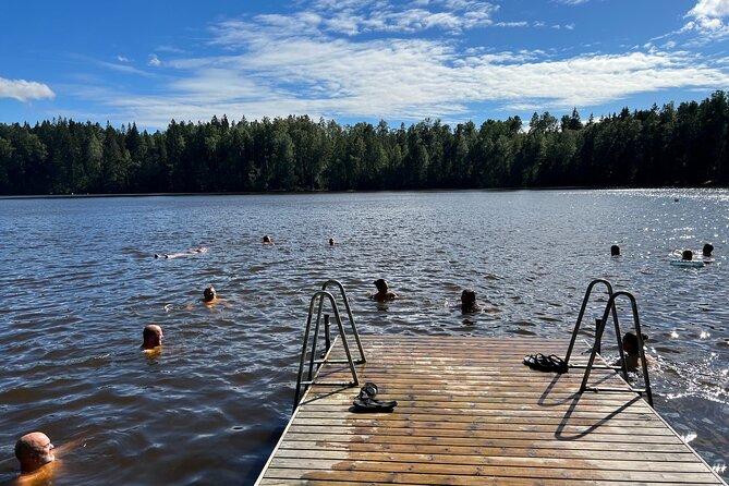 National Park Hike & Finnish Smoke Sauna Experience with Campfire Lunch - Campfire lunch beside the lake